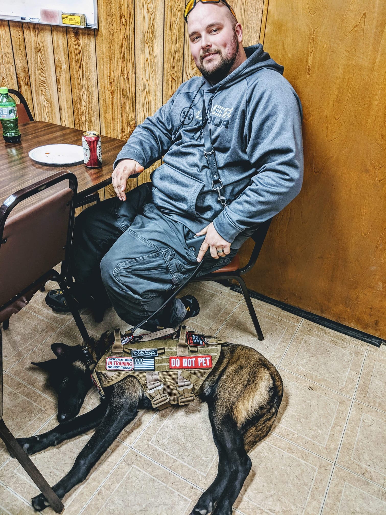 Handler and service dog training session